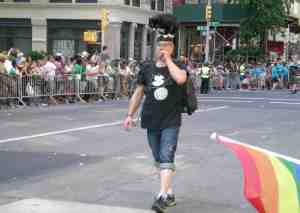 Live cat atop this guy's head.
