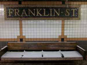 Lower Manhattan subway stop; not the best day to bench sit.