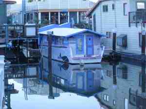 Tim Burton-esqe style houseboat from behind.